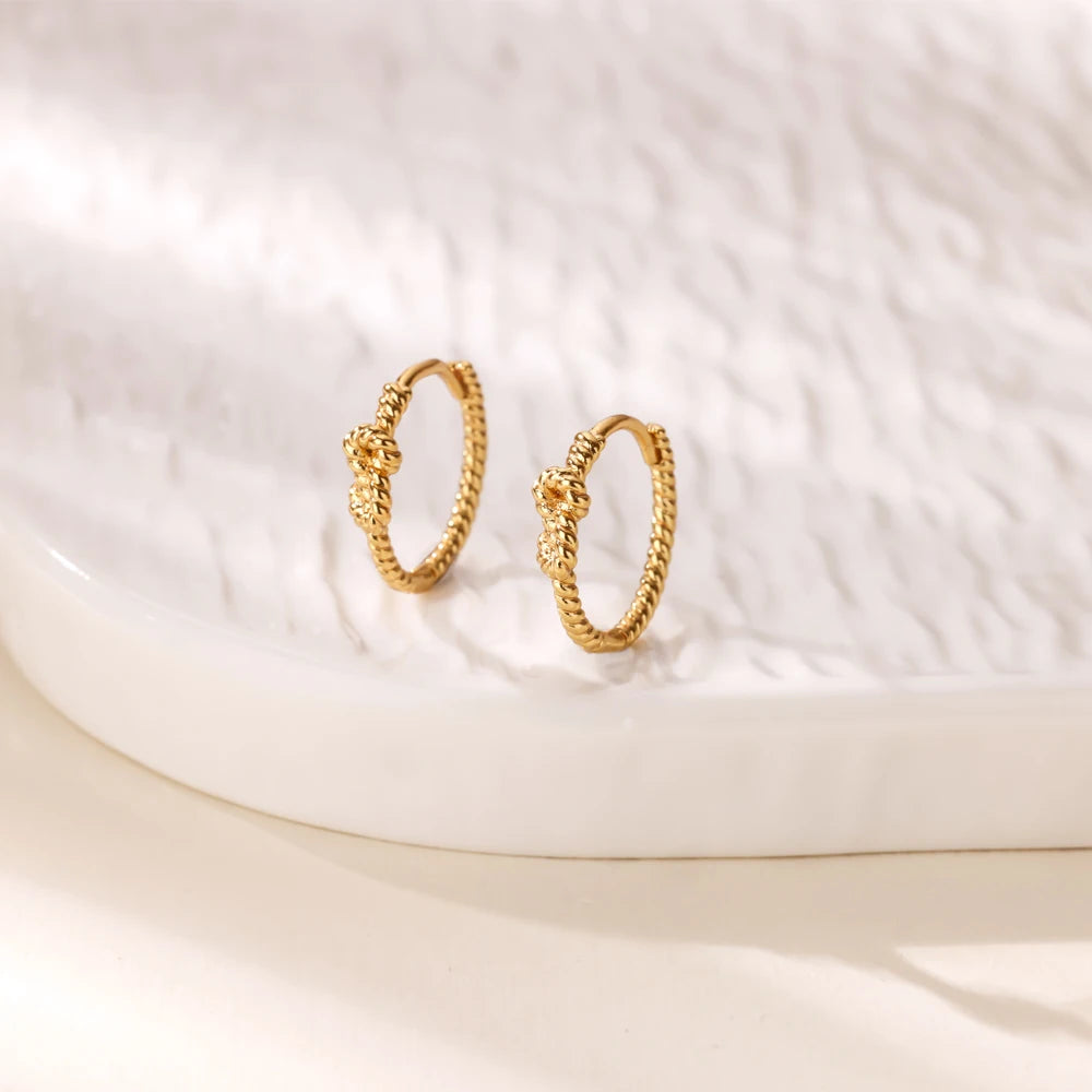 Boucles d'oreilles créoles en zircon cubique ton or