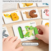 Hands are using letter cards in a focus training game to practice stroke writing and matching letters.