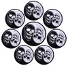 A set of ten black and white embroidered iron-on patches featuring skulls and horror imagery.