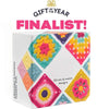 A box of 50 mix and match crochet square pattern cards featuring colorful floral designs.