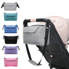 A large capacity stroller organizer bag with a cup holder shown in various colors and attached to a stroller.