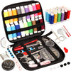 A black sewing kit box containing various threads, needles, scissors, and other essential sewing accessories.