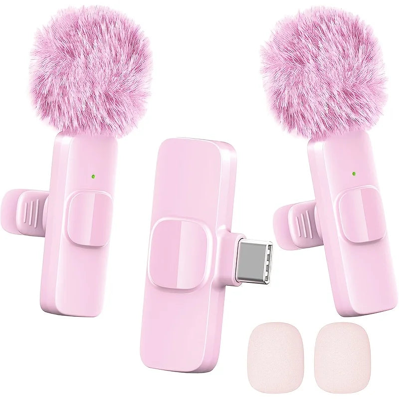 Pink wireless lavalier microphone with fuzzy pink foam cover and clip attachments