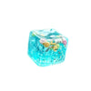 A clear blue glass squeeze toy shaped like an ocean creature with sea life decorations.