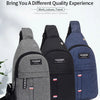Three dark colored fanny packs in gray, black, and blue displayed against a white background.