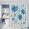 Light blue peony floral shower curtain set featuring a rug and toilet cover