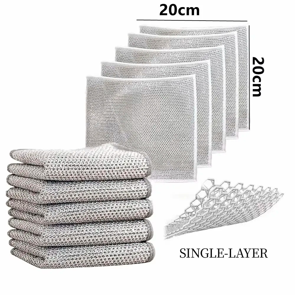 A stack of white single-layer microfiber cleaning cloths and a stack of gray double-layer microfiber cleaning cloths.