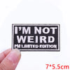 Black embroidered iron-on letter patch with the text I'M NOT WEIRD and PM LIMITED EDITION