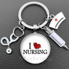Silver necklace keychain featuring a round pendant with the text I NURSING and a medical symbol.