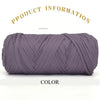 A skein of thick purple polyester blend yarn coiled and displayed for knitting or crochet projects.