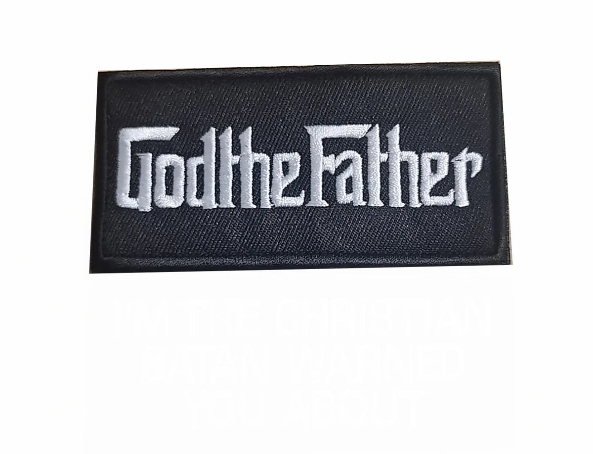 Black embroidered patch with the text GodtheFather in white script.