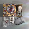 A package of a premium metal spinning top battle set featuring a dark dragon design and associated components.