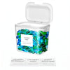 Clear plastic container filled with blue and green laundry pods and a white lid.