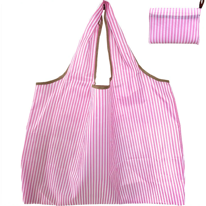 Pink and white striped foldable oxford cloth tote bag with a matching striped pouch.