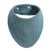 A soft, teal organic cotton muslin baby bib with an absorbent bandana and a loop for fastening.