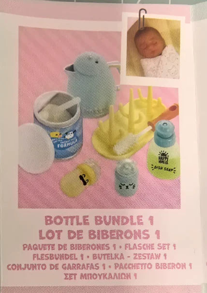 A collection of baby bottle accessories including a silicone bottle, yellow food accessories, and a glass bottle.