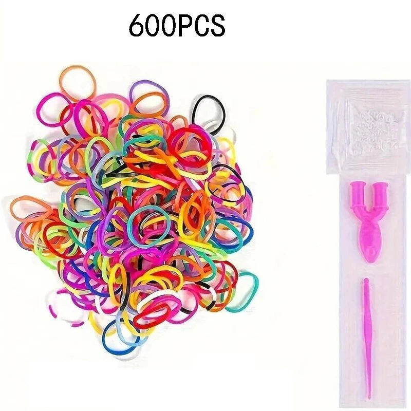 A large pile of 600 colorful rubber bands and a pair of pink pliers for bracelet making.