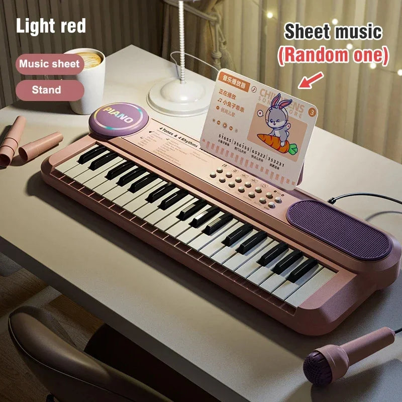 A pink electronic piano with a microphone stand and sheet music is displayed on a table.