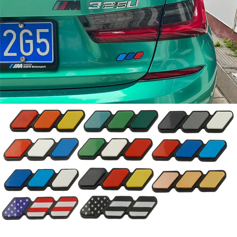 A collection of 12 tri-color grille emblem stickers in various colors and designs for Toyota trucks and SUVs