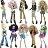 A collection of various fashion dolls in different outfits and styles.