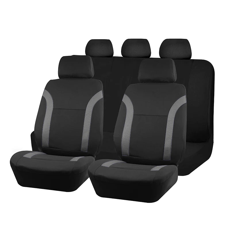 A set of black and gray two-tone car seat covers with headrests shown in a row.