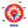 A red wooden clock face with numbers and markings, showing the time 4:30.