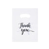 A white card with the handwritten text Thank you