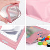Pink mylar ziplock bags with clear windows for jewelry and small item packaging