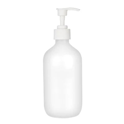 White refillable soap dispenser bottle for shampoo, shower gel, and lotion.