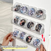Clear acrylic wall-mounted display shelf with height adjustment showing various decorative items.