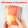 A hand holds a colorful book featuring 108 sheets and 54 patterns for a Montessori animal origami craft kit.