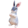 A gray and white plush rabbit stuffed animal with pink ears looking forward.
