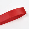 A roll of red double face satin ribbon, approximately 25 yards long.