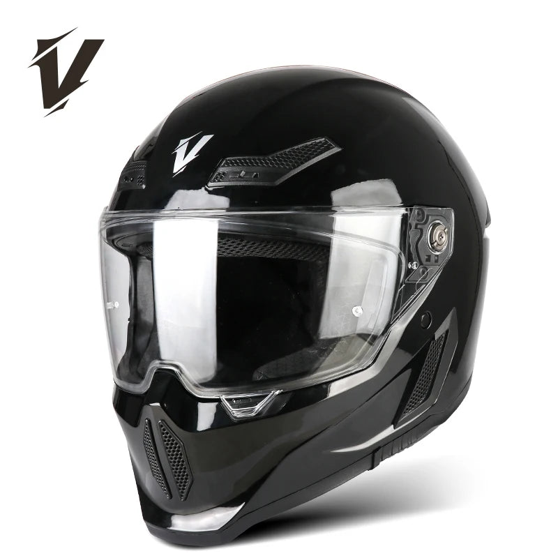 A black full-face motorcycle helmet with a clear visor and ventilation features is shown from the front.
