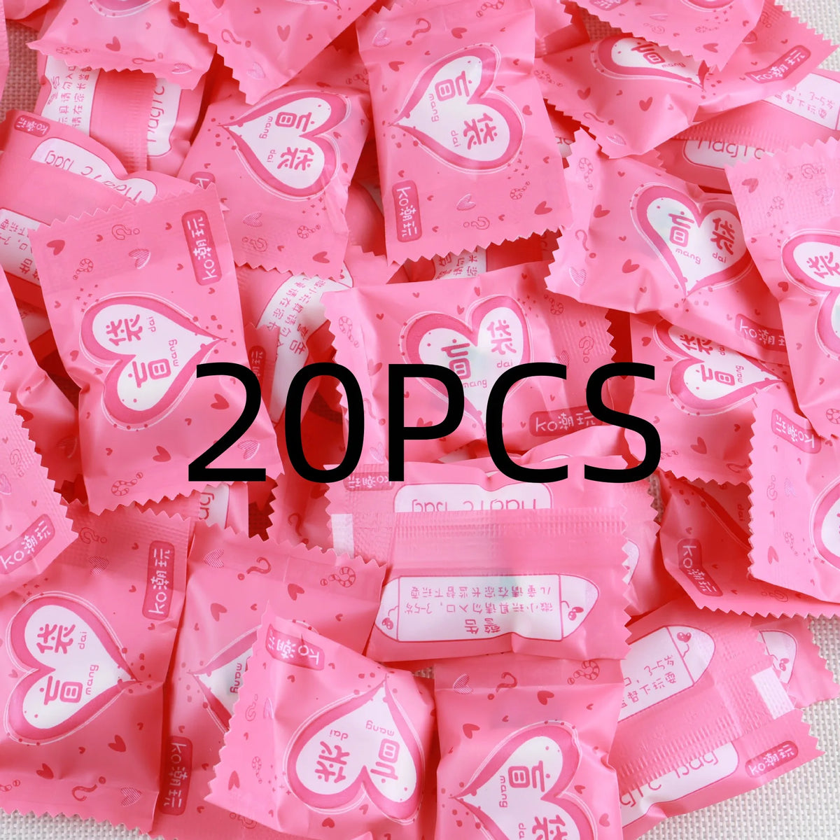 A pile of pink, heart-shaped miniature resin food and drink figurines for DIY decor.
