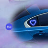 A blue car interior showing a heart-shaped ambient light feature.
