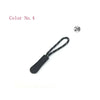 A black plastic zipper pull with a black cord and small white dots, labeled Color No. 4.
