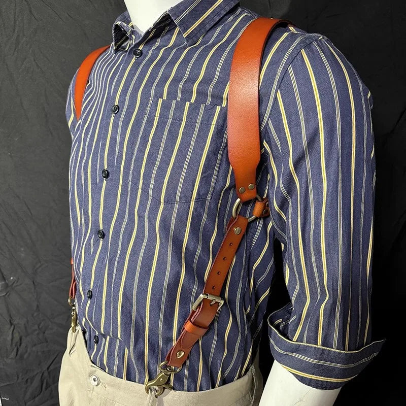 A man's blue striped shirt worn with genuine leather double shoulder suspenders.