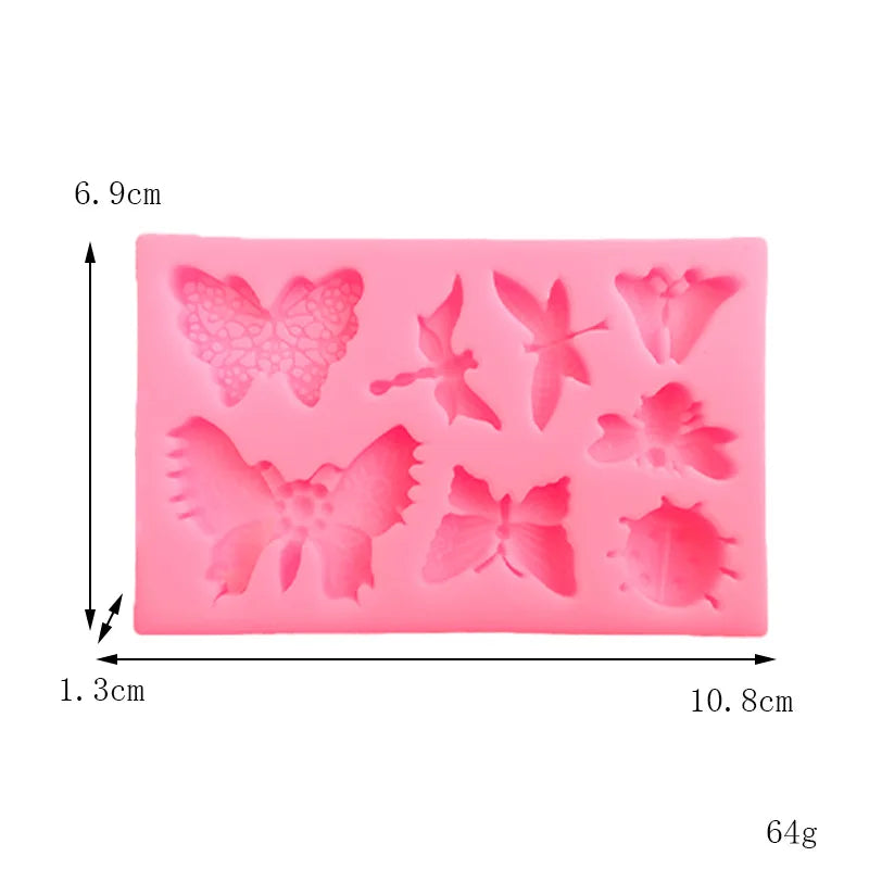 A pink silicone mold shaped like a butterfly for crafting soap, chocolate, or resin.