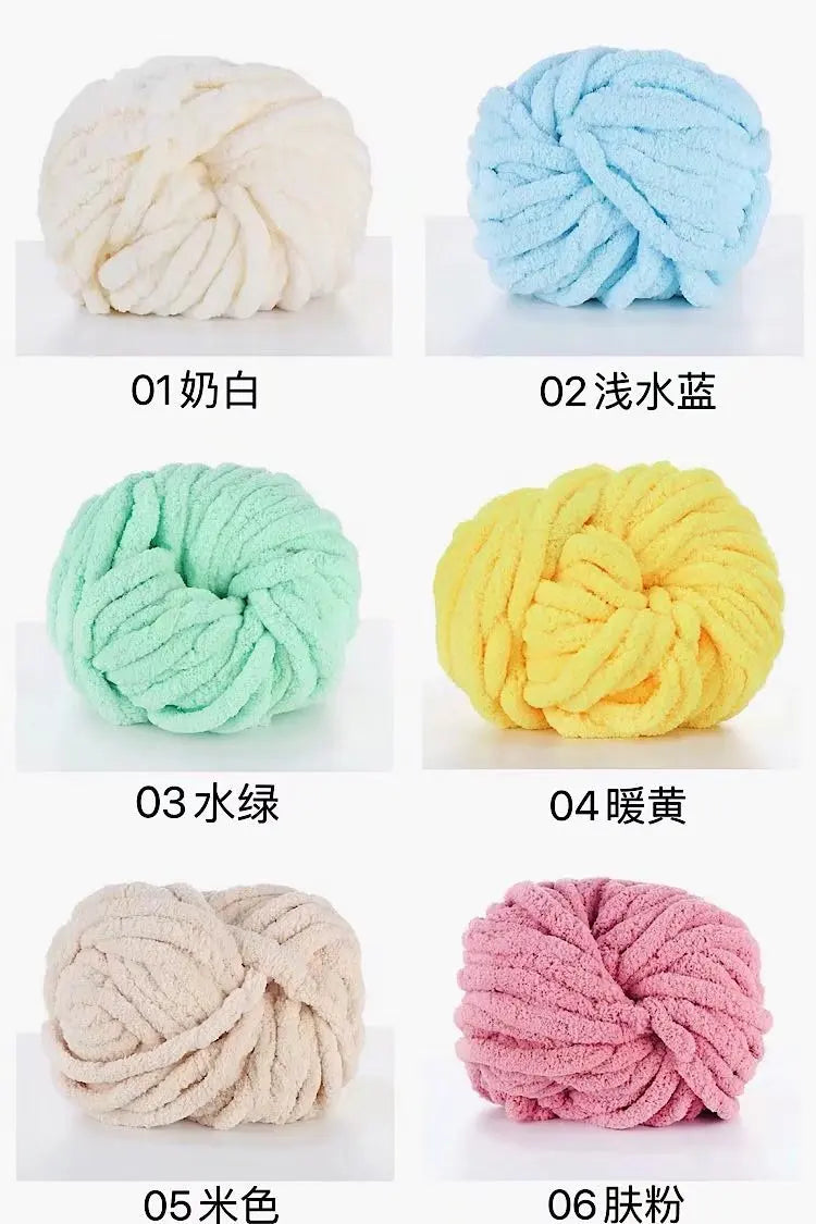 Six balls of chunky acrylic yarn in white, light blue, mint green, yellow, beige, and pink.