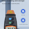 A black digital tachometer measuring 956.3 m/min RPM, used for data recording and storage.