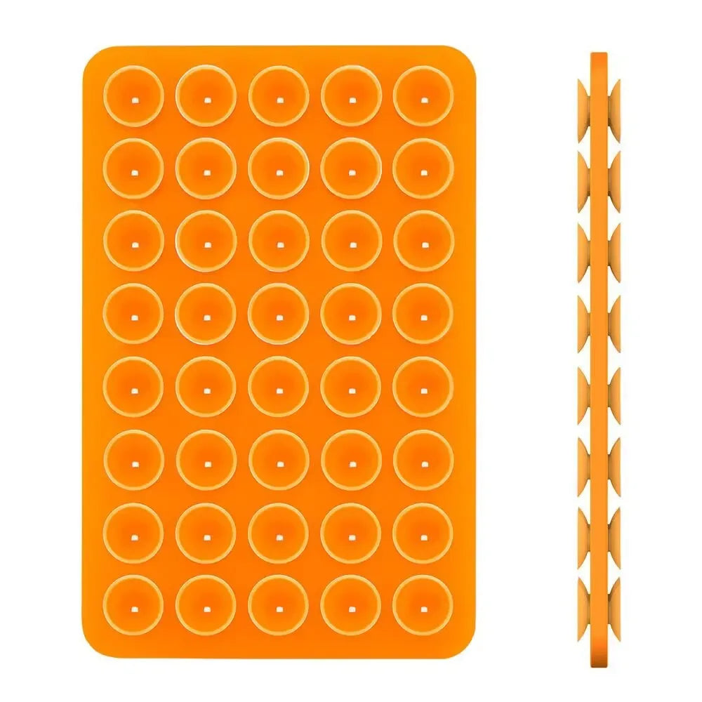 Orange silicone suction cup phone mount for hands-free use