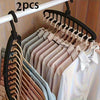 Two hangers are displayed on a black rack, showing various colored shirts and blouses.