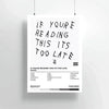 A white canvas print featuring the text If you're reading this it's too late, with a small silhouette of Drake.