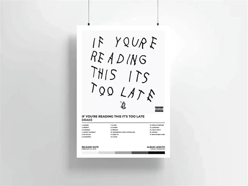 A white canvas print featuring the text If you're reading this it's too late, with a small silhouette of Drake.