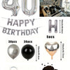 A kit featuring black and silver balloons, including foil numbers, heart-shaped balloons, and a large quantity of decorative 