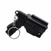 Black mini pistol-shaped keychain accessory with a metal ring attached