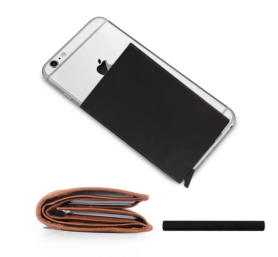 A silver smartphone is shown next to a brown slim metal RFID blocking card holder with a pop-up design.