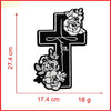 Black embroidered cross patch with roses on a white background, measuring 27.4 cm high and 17.4 cm wide.