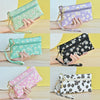 A collection of floral print PU leather wristlet wallets in various shades of green, purple, and black.